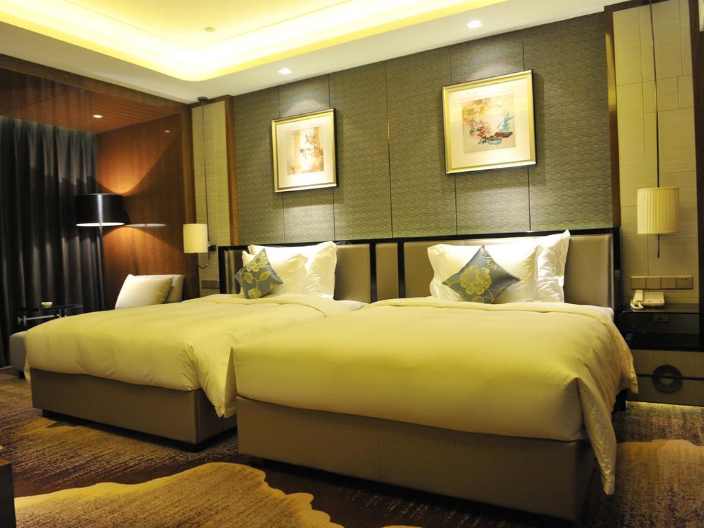 מלון Ramada Plaza Liuzhou Liudong חדר תמונה